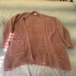 Mauve cardigan. very fuzzy and cozy.